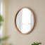 Miroir mural circulaire avec cadre en bois-655637364