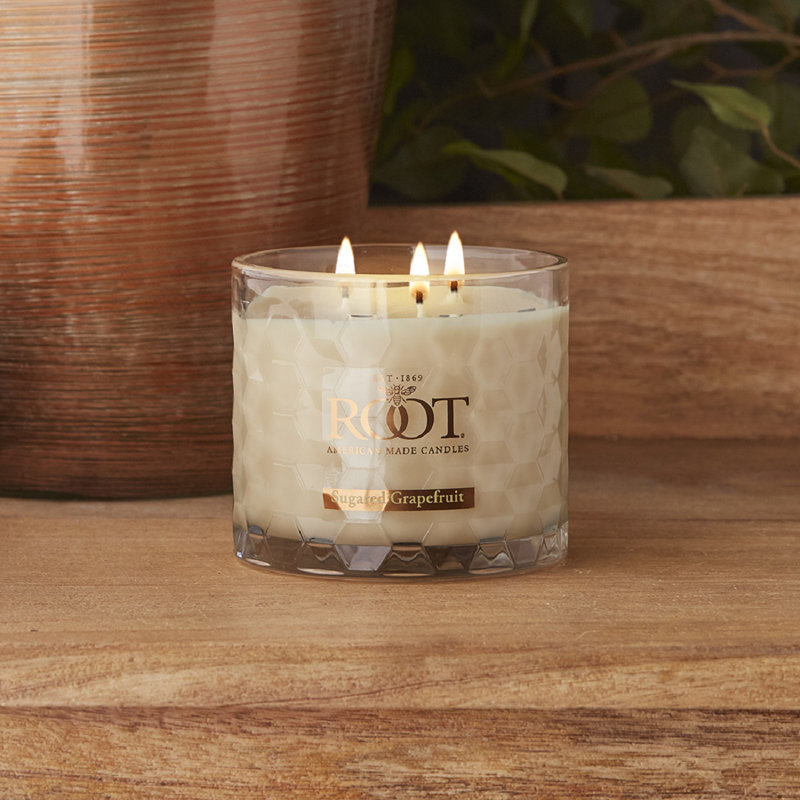 Bougie en pot parfumée au pamplemousse sucré