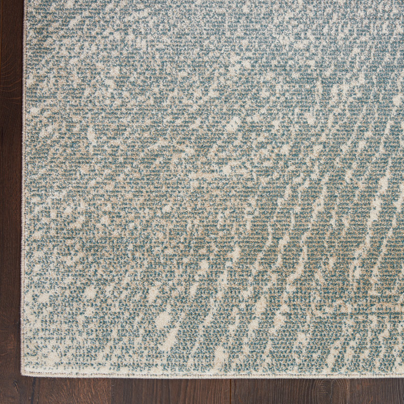 Abstract Elegance 70''x46'' Easy-Care Synthetic Area Rug in Grey