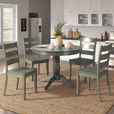 Norita 4-Person Solid Wood Pedestal Dining Set