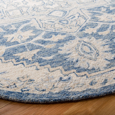 Tapis ivoire / bleu en laine et en coton touffeté à la main Cyrrilagnin