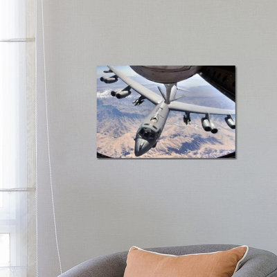 A B-52 Stratofortress Receives Fuel From A KC-135 Stratotanker Over Afghanistan by Stocktrek Images - Wrapped Canvas Print