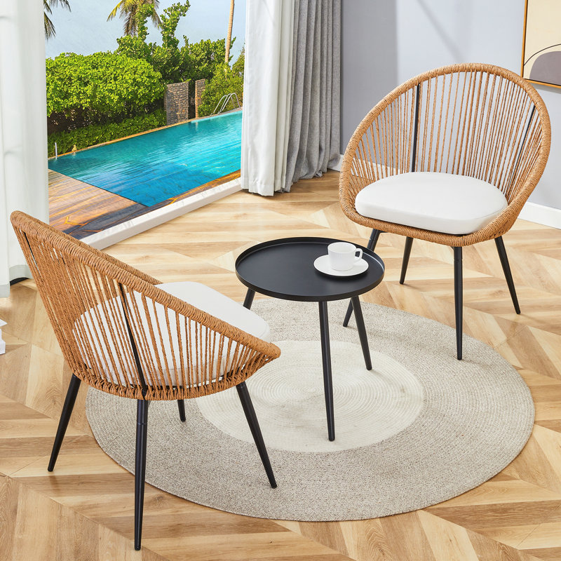 2 - Person Outdoor Seating Group with Rattan Swivel Chairs and Round Coffee Table