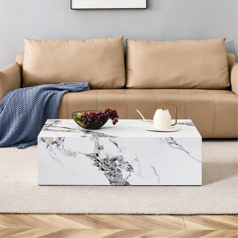 Table basse moderne avec motif en marbre, design élégant et durable pour votre espace de vie.