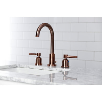Kingston Brass Concord Two-Handle 3-Hole Deck Mount Widespread Bathroom Faucet with Brass Pop-Up Drain