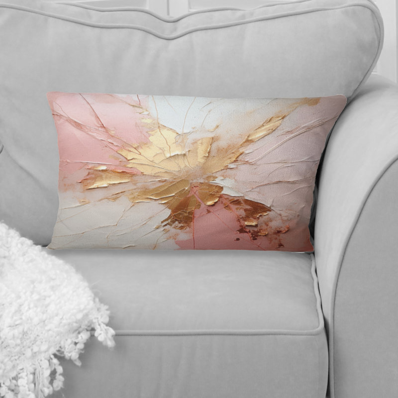 Coussin décoratif or et rose avec peinture abstraite