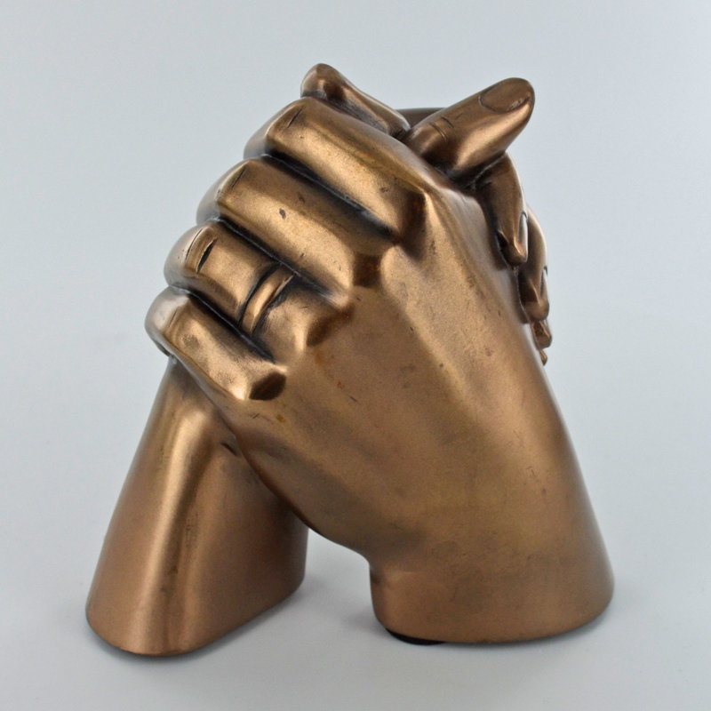 Tergel Holding Hands Anniversary Sculpture