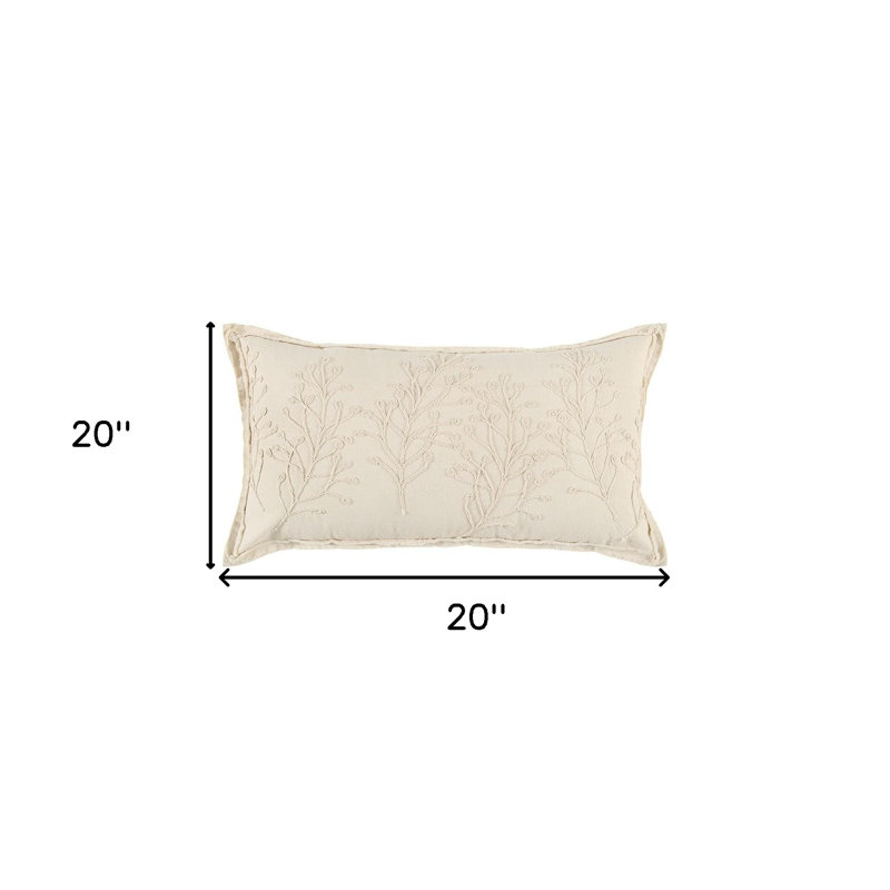 Coussin lombaire beige à motif botanique brodé