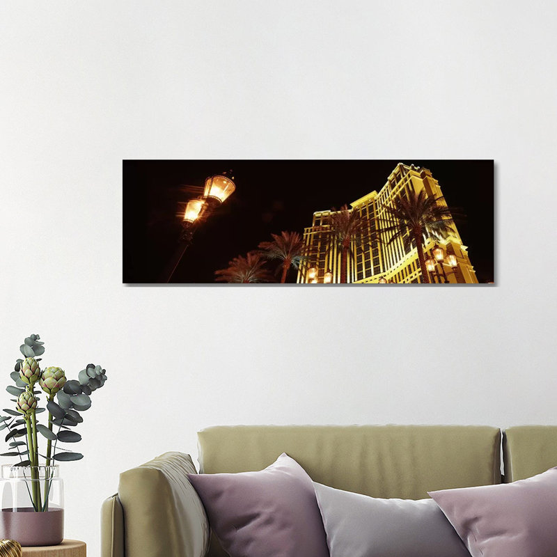 Low Angle View of a Hotel Lit up at Night, the Strip, Las Vegas, Nevada, USA 1 Piece Wrapped Canvas Panoramic Wall Art