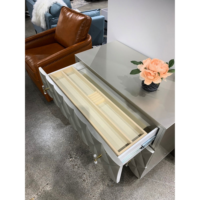 Console métallique argentée et champagne avec arrêt et rangement quincaillerie de ton or 3 tiroirs pleine extension