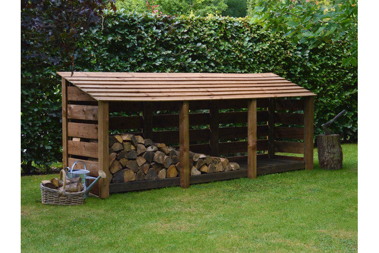 large wood shed in the backyard filled with plenty of firewood