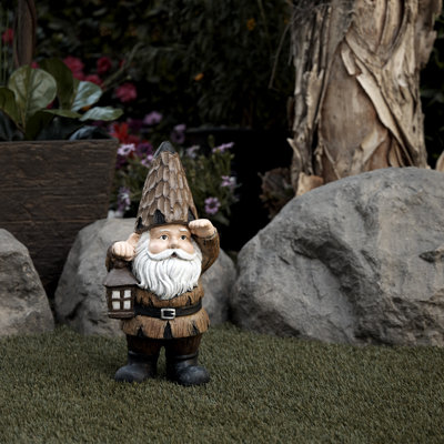 Statue gnome avec lanterne