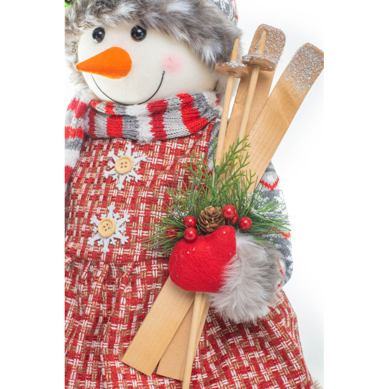 Bonhomme de neige au point de croix rouge