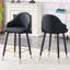 Tabourets noirs en cuir de polyuréthane avec repose-pieds doré, ensemble de 2-1172754999