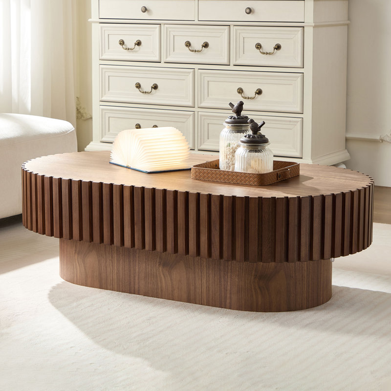 Oval MDF coffee table with veneer – Modern living room table with grooved design and sturdy base in walnut color