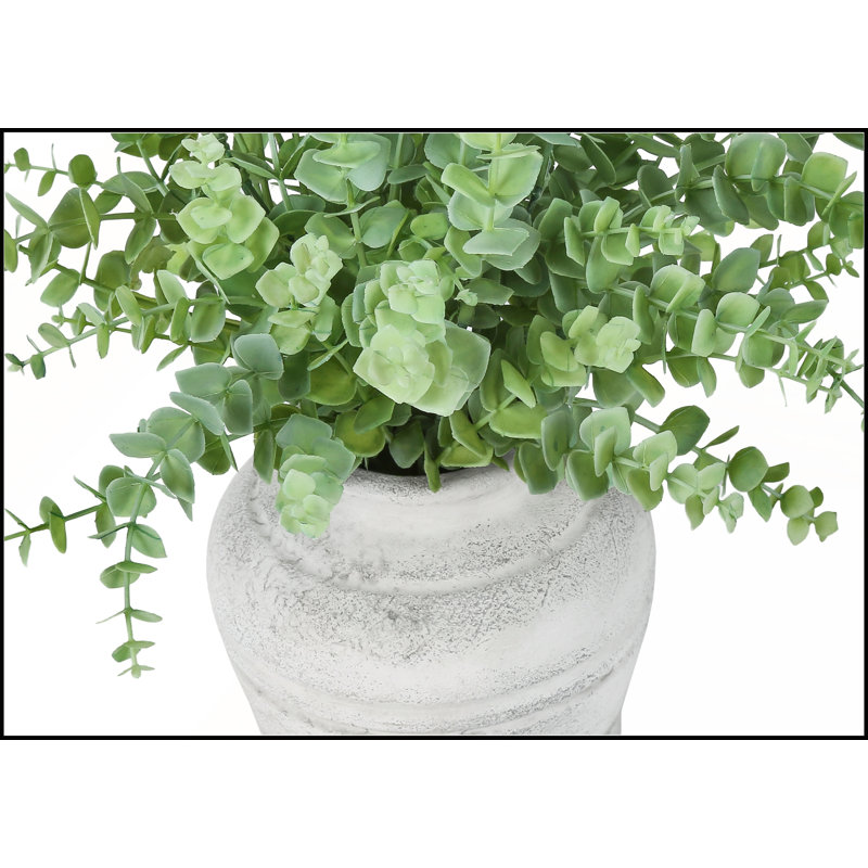 Ensemble de 2 brins d'eucalyptus artificiels, 40 cm de hauteur, dans des pots blancs modernes pour une décoration de table contemporaine.