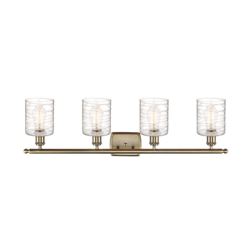 Leilani 4 - Light Dimmable Vanity Light, Antique Brass, Clear Deco Swirl, 60 Watt Vintage Incandescent Bulb