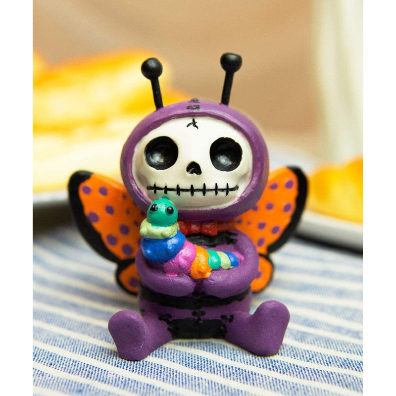 Figurine cymbre papillon