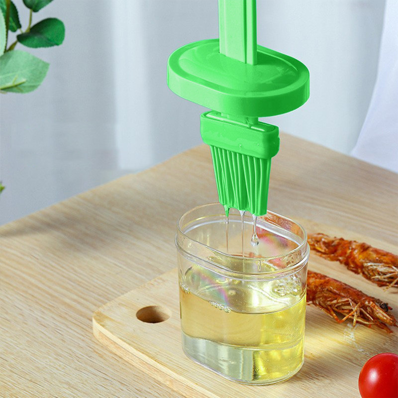 Bouteille d'eau, une brosse à huile et une brosse à huile, Vert