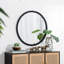 Miroir circulaire avec cadre perlé en métal
