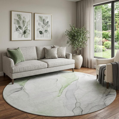 Tapis rond lavable abstrait vert et ivoire 8 pi avec protection UV