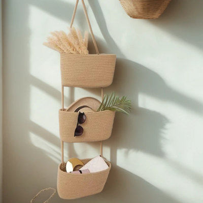Panier de rangement mural en corde de coton, idéal pour les chambres d'enfants, les salles de bain et les salons.