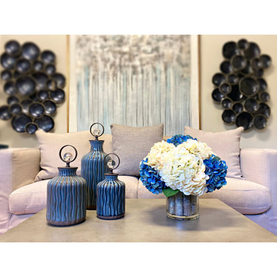 Assorted Hydrangeas Arranged in Glass Vase with Birch Sticks