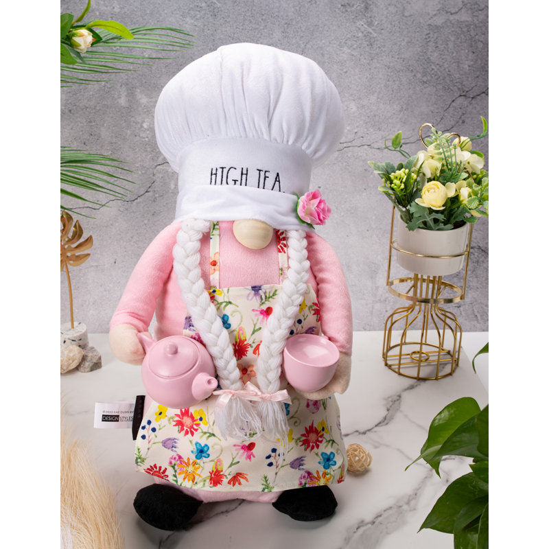 Gnome de printemps moelleux avec théière