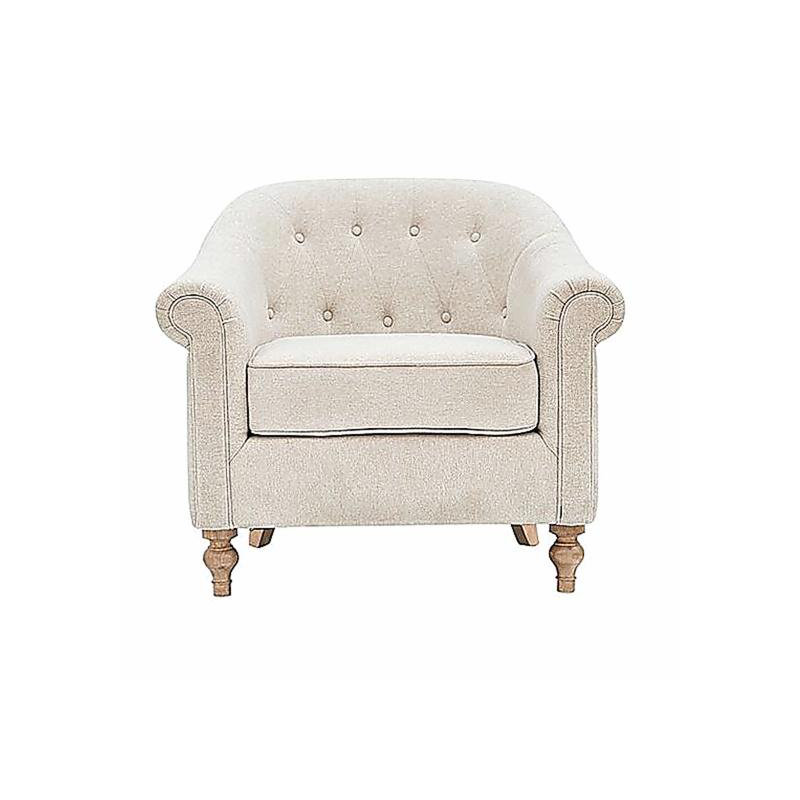 Fauteuil capitonné