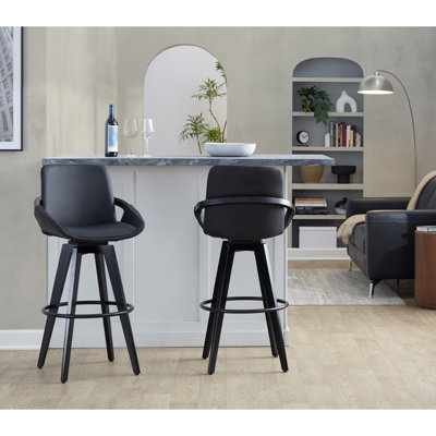 Tabouret de bar à hauteur fixe avec pivot en bois noir et similicuir crème avec repose-pieds rond en métal noir - ensemble de 2