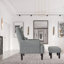 Chaise de salon grise avec fauteuil inclinable et coussins confortables en tissu doux