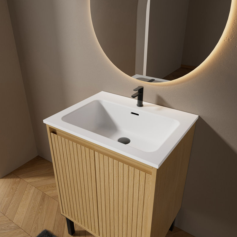 Ensemble de meuble-lavabo simple autoportant avec lavabo en résine à surface solide intégré, portes d'armoire cannelées et pieds en métal