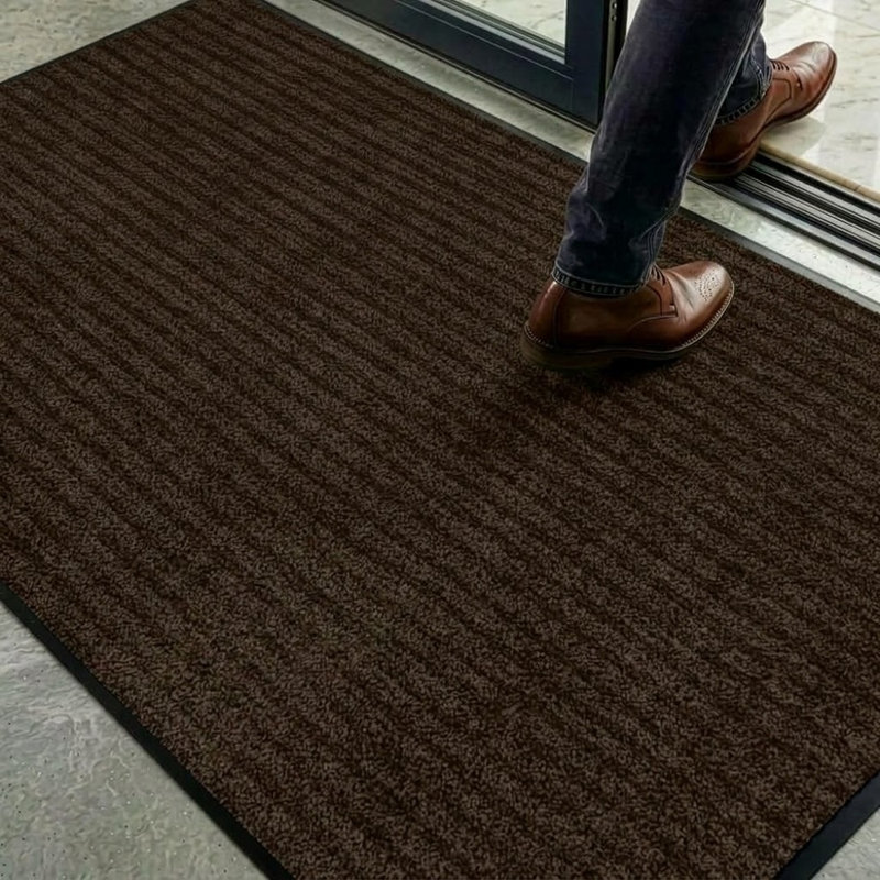 Tapis d'entrée robuste et antidérapant brun