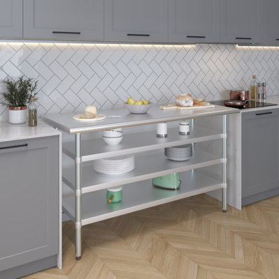Table en acier inoxydable avec trois tablettes inférieures