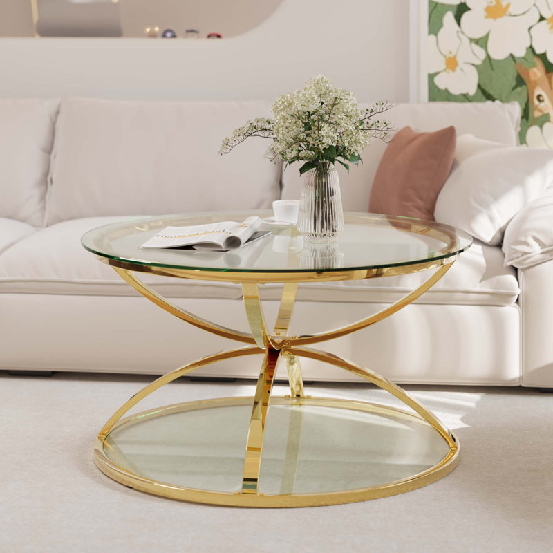 Table basse moderne en verre avec 2 niveaux, cadres en forme d'anneau, structure en métal et verre trempé transparent