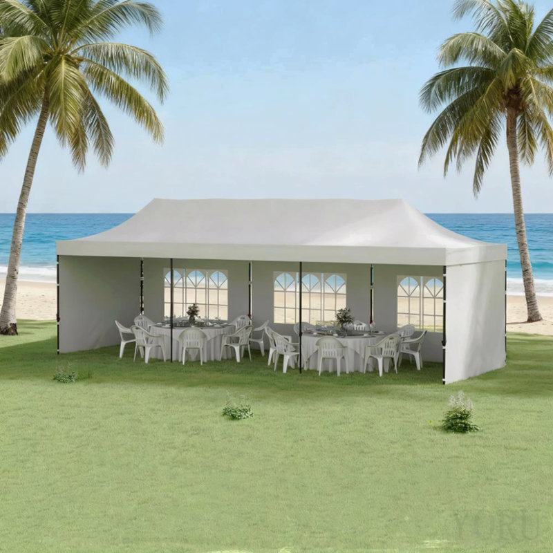 Tente pop-up avec auvent et sacs de sable pour les fêtes
