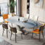 Table de salle à manger moderne en pierre supercristalline avec base en métal en forme de X-661987601