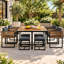 Ensemble de salle à manger de patio Arivent 9 pièces en bois massif avec chaises et poufs rembourrés-239864284