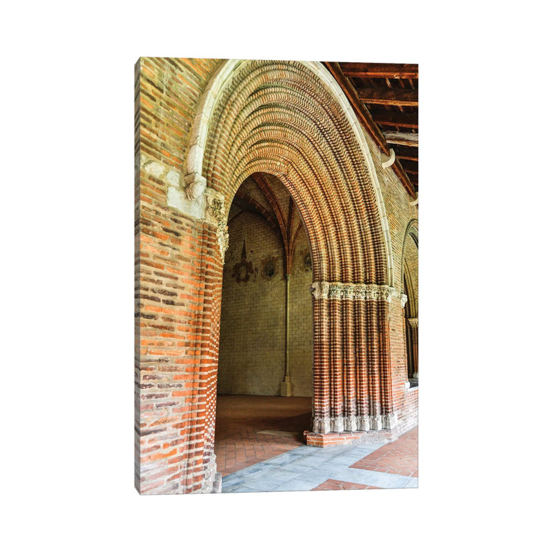 Arched Entrance To The Courtyard, Church Of The Jacobins, Toulouse, France by Hollice Looney - Wrapped Canvas Print