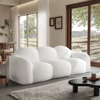 Canapé à accoudoirs rembourré en tissu moelleux avec accoudoirs Ivona