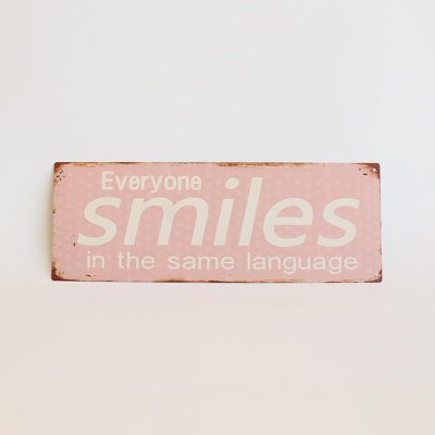 Everyone Smiles In The Same Language Sign