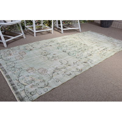Handcrafted Vintage Turkish Rug with  Green Floral Pattern for Elegant Home Style