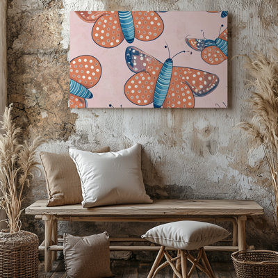 Une œuvre d'art avec motif de papillons stylisés disposés contre une toile d'art mural de qualité supérieure, prête à être accrochée
