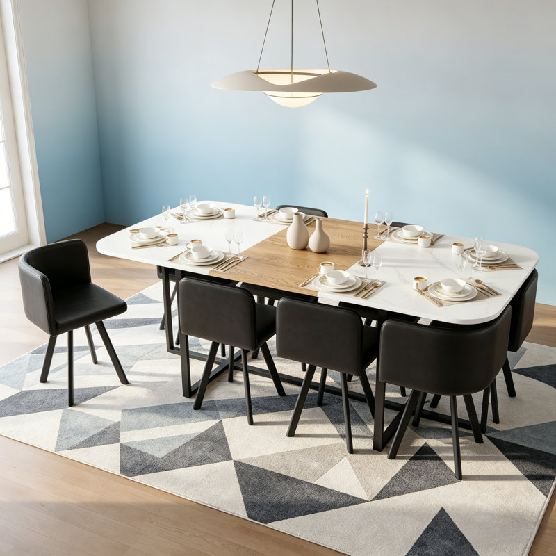 Cet ensemble de table et de chaises moderne et minimaliste de forme carrée offre à la fois un attrait esthétique et des matériaux de haute qualité, offrant des sièges confortables pendant de longues périodes et répondant aux besoins quotidiens de plusieurs personnes.