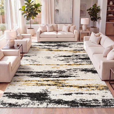 Tapis beige / noir / jaune à poils longs Jubei Modern Bold Strie