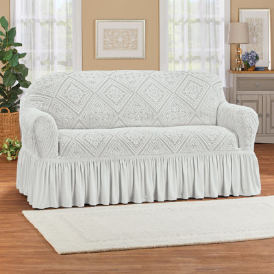 Élégante housse de meuble extensible avec bordure à volants