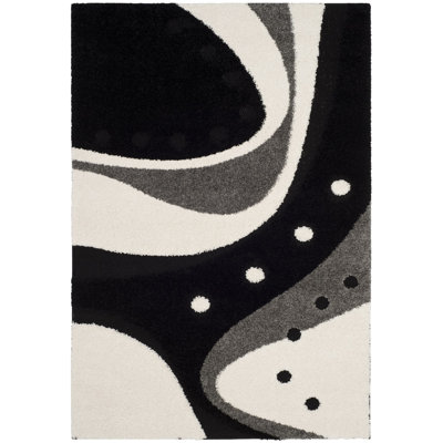 Ashal Abstract Black/Ivory Area Rug
