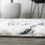 Tapis blanc / gris à poils longs à rayures géométriques Collenn-1637531398