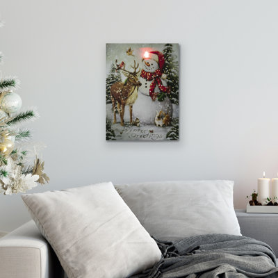 Bonhomme de neige illuminé et renne de Noël