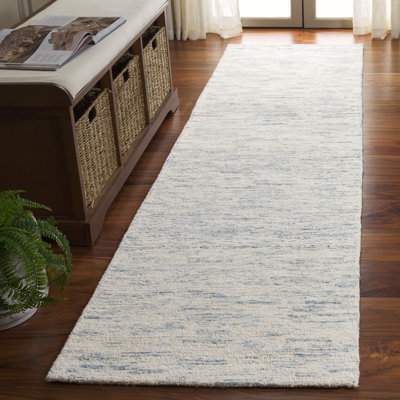 Tapis abstrait touffeté à la main en laine / coton touffeté à la main en ivoire / bleu clair Touete